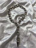 Spiked chain pendulum choker