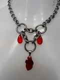Beating heart blood drip choker